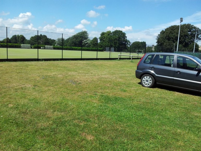 PERFO geogrid used to reinforce sports field parking and overflow parking at Uppingham School. Easily installed grids provide a sturdy natural draining parking area